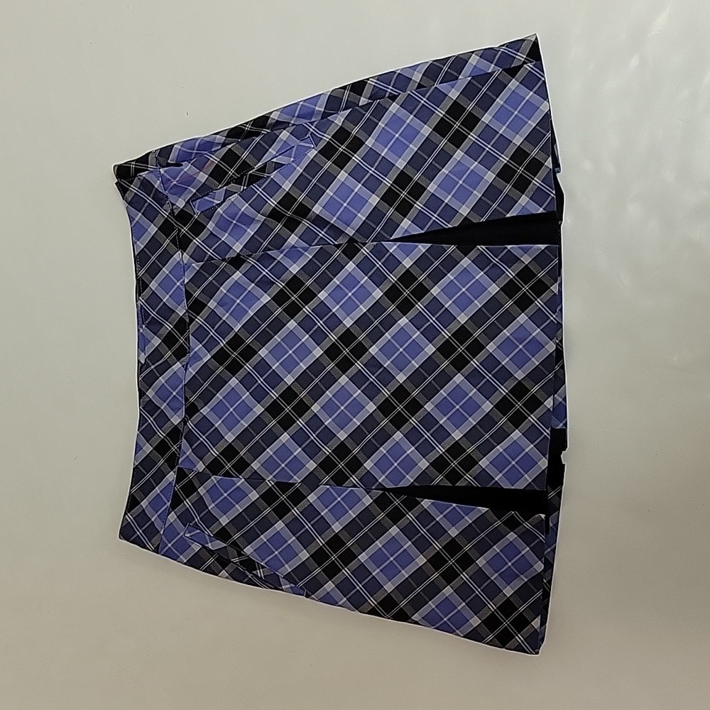 Izod women's plaid pleated golf skort, size 6 purple and black